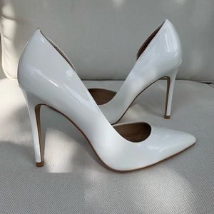 White patent leather pumps